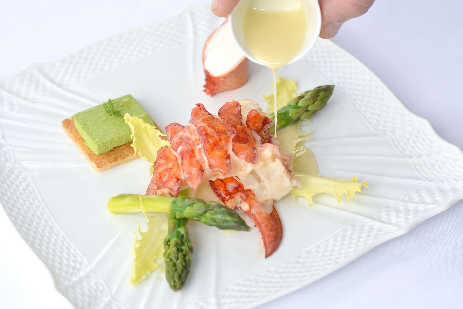 Poached lobster with asparagus